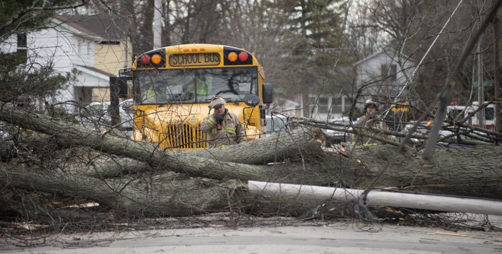 Michigan winds blow roofs away down trees and power lines