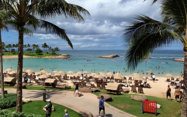 Tourists and locals play on Ko'Olina beach on the island of Oahu Hawaii Jul 29 2013. Reuters