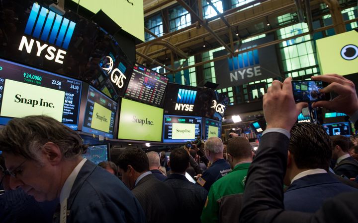 Traders at the New York Stock during the Snap Inc. float