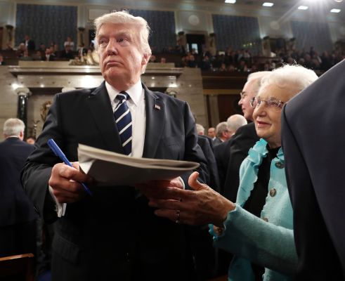 President Donald Trump leaves the House Tuesday night