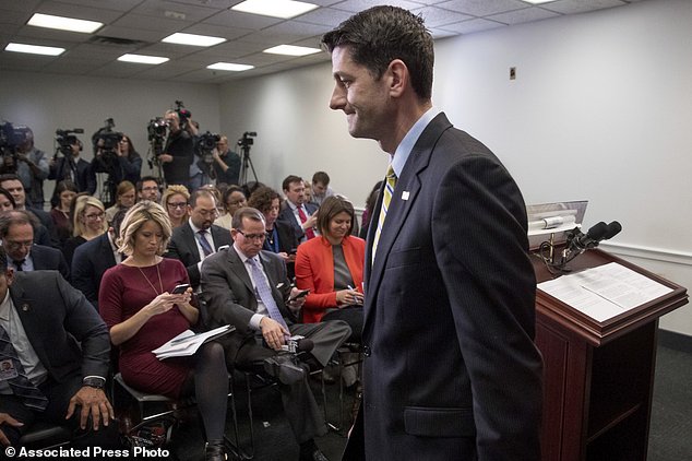 House Speaker Paul Ryan of Wis. leaves a news conference following a GOP party conference at the Capitol Wednesday