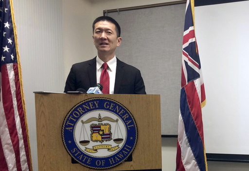 Hawaii Attorney General Doug Chin speaks at a news conference in Honolulu announcing the state of Hawaii has filed a lawsuit challenging President Donald Trump's travel ban. Hawaii is planning to challenge Trump&#039