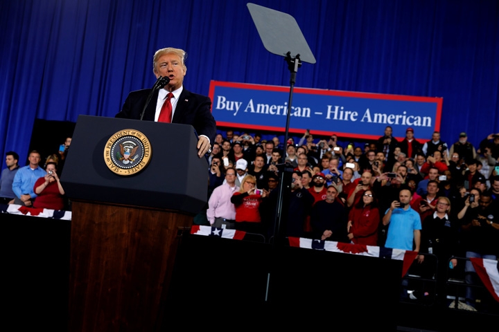 Trump tours new cars with auto industry leaders in Michigan on Wednesday.
Credit REUTERS  Jonathan Ernst