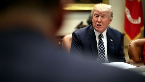 U.S. President Donald Trump attends a listening session with CEOs of small and community banks at the White House in Washington