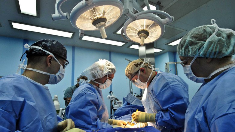 Doctors Performing Surgery