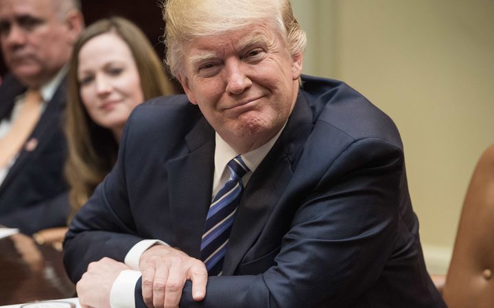 US President Donald Trump attends a meeting about healthcare in the Roosevelt Room at the White House in Washington DC