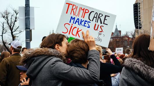 With President Trump's first action of presidential business including an executive order that directly impacts the future of the Affordable Care Act many marchers carried signs in support of keeping the health care plan put in place under former Pr