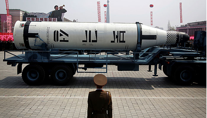 A submarine missile is paraded across the Kim Il Sung Square North Korea during a military parade