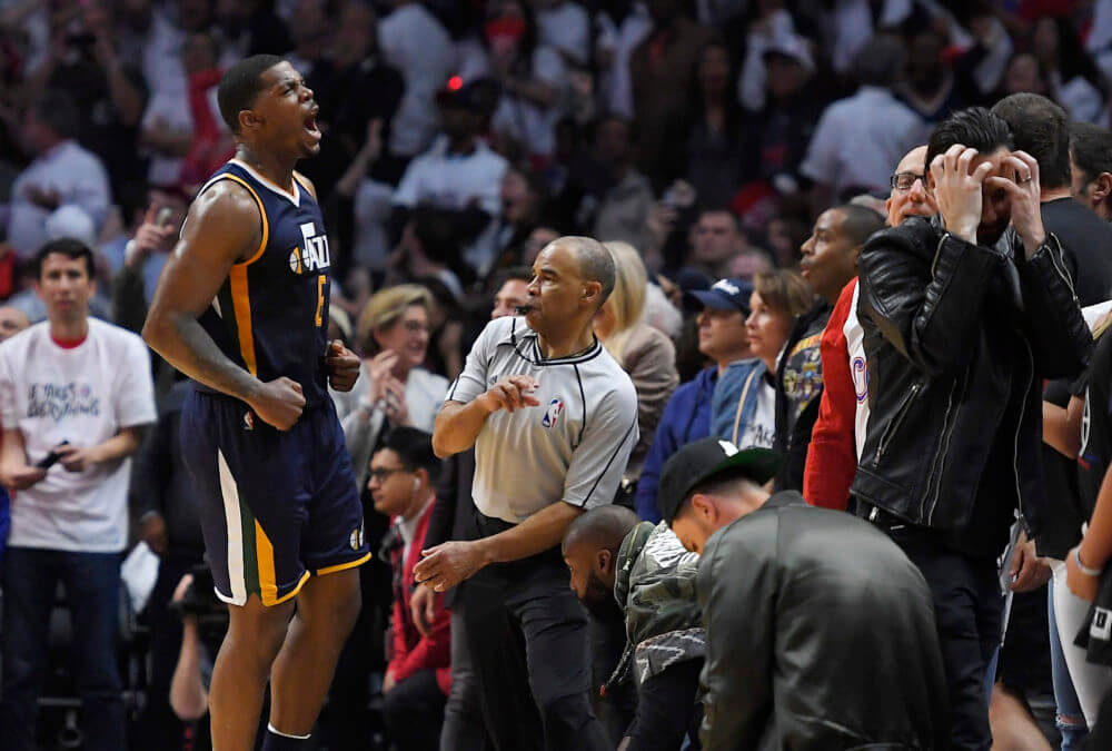 Utah Jazz forward Joe Johnson left celebrates after hitting the game-winning basket in Game 1 of an NBA basketball first-round playoff series against the Los Angeles Clippers Saturday