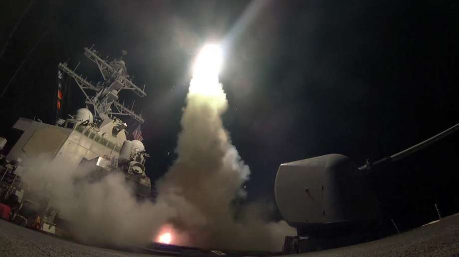 In this image provided by the U.S. Navy the guided-missile destroyer USS Porter launches a tomahawk land attack missile in the Mediterranean Sea Friday