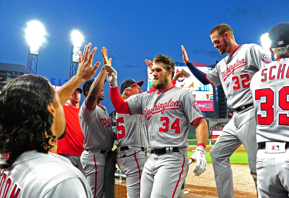 Bryce Harper’s teammates greet him after his second-inning grand slam