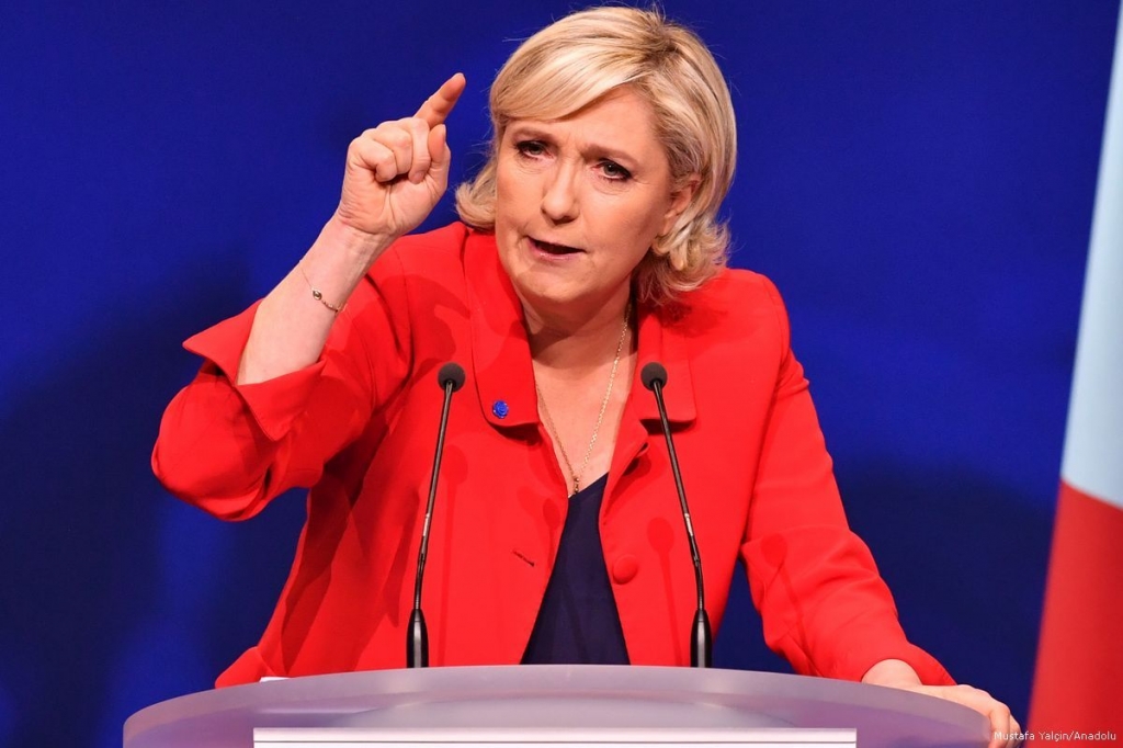 Image of Marine Le Pen the leader of France's far-right Front National party delivers a speech during a campaign meeting in Paris France on 17 April 2017