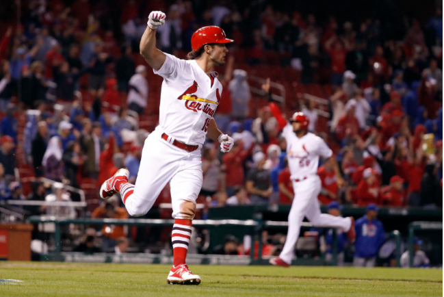 Cardinals&#039 left fielder Randal Grichuk celebrates his walk-off hit to beat the Cubs 4-3 in Sunday's season opener at Busch Stadium