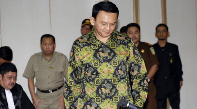 Jakarta Governor Basuki “Ahok” Tjahaja Purnama takes his seat for his court hearing in Jakarta Indonesia