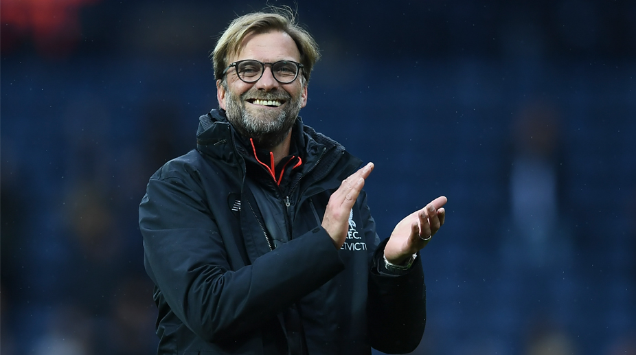 Liverpool manager Jurgen Klopp applauds the Red's supporters after the full-time whistle