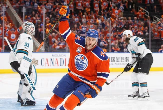 San Jose Sharks&#39 Martin Jones and Brent Burns react as Edmonton Oilers&#39 Zack Kassian celebrates his goal during second period NHL playoff action in Edmonton Alta. on Friday