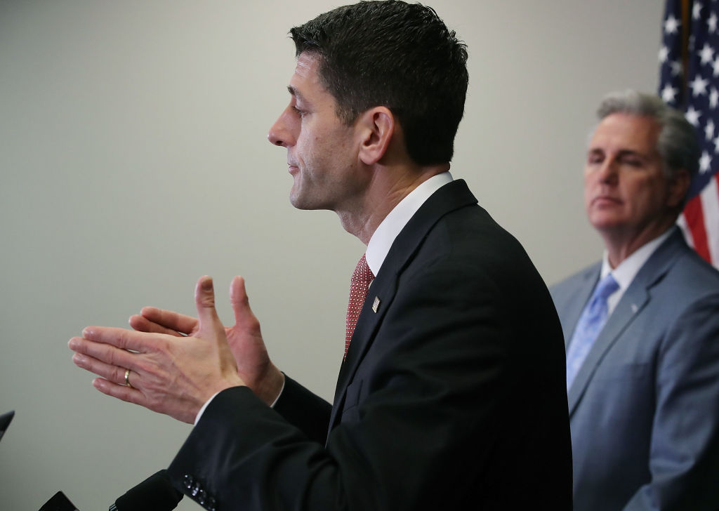 WASHINGTON DC- MARCH 28 House Speaker Paul Ryan , speaks while flanked by House Majority Leader Kevin Mc Carthy, during a media briefing after attending a closed House Republican conference on Capitol Hill