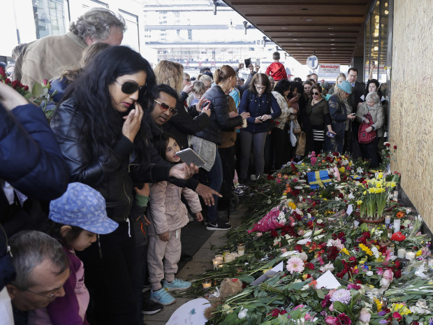 Thousands gathered Sunday at the Swedish department store where a 39-year-old Uzbek man is suspect of committing a deadly truck attack. Police say the suspect had been ordered to leave the country and expressed extremist sympathies