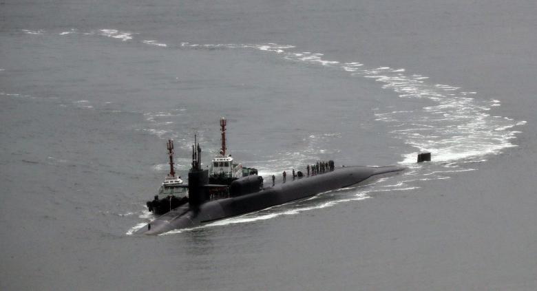 Reports of N Korea artillery drill as US submarine docks in South