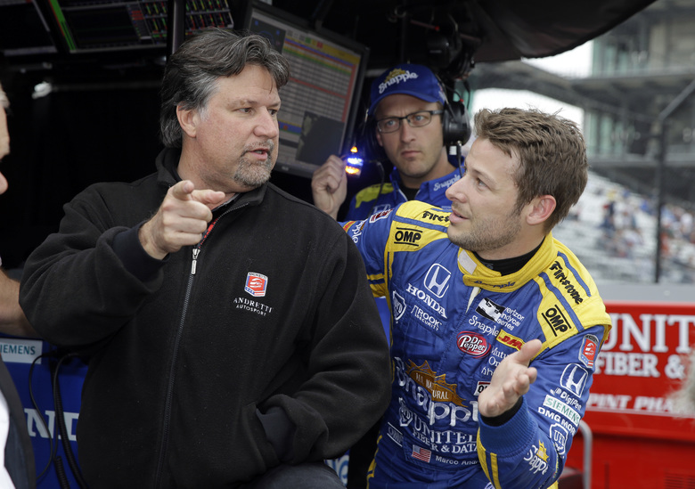 Marco Andretti right talks with car owner and father Michael Andretti during a practice session for the Indianapolis 500 auto race at Indianapolis Motor Speedway in Indianapolis. Michael Andretti needed some