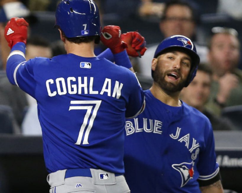 Kevin Pillar right celebrates with Jays third baseman Chris Coghlan after Coghlan hit a solo home run in the sixth inning of a 7-1 win over the Yankees