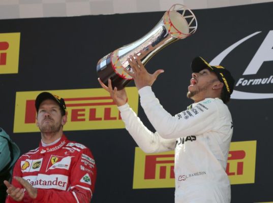 Mercedes driver Lewis Hamilton of Britain celebrates