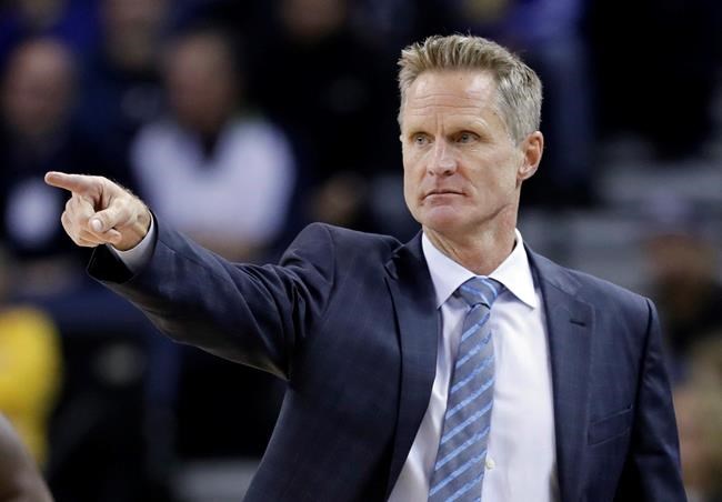 Golden State Warriors head coach Steve Kerr directs his team during the first half of an NBA basketball game against the Atlanta Hawks in Oakland Calif. Golden State Warriors coach Steve Kerr is not yet