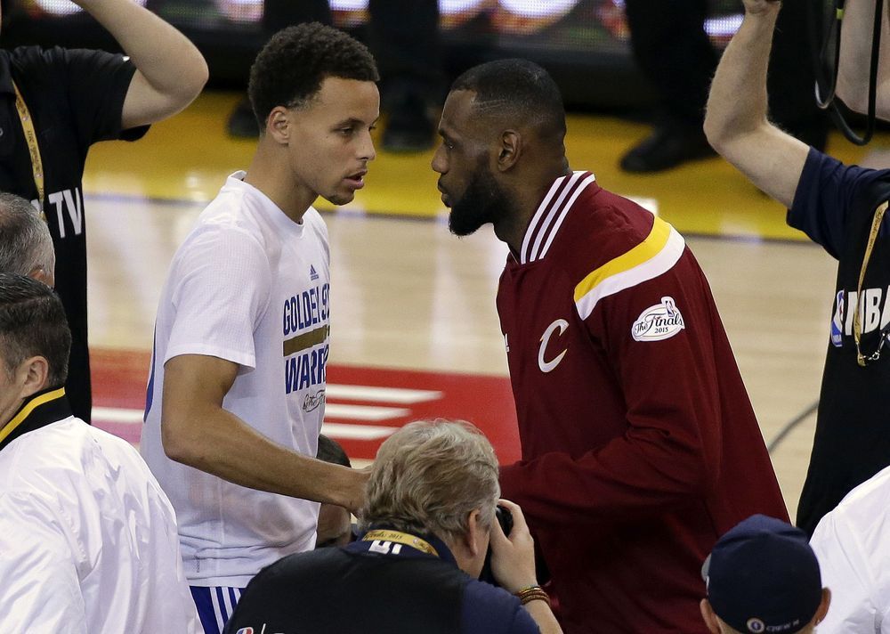 Golden State Warriors guard Stephen Curry left shakes hands with Cleveland Cavaliers forward Le Bron James before Game 5 of basketball's NBA Finals in Oakland Calif. While there have been 14 rematches in NBA Fin