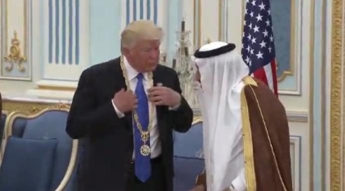 President Donald Trump accepts Saudi Arabia's highest honor during a visit Saturday