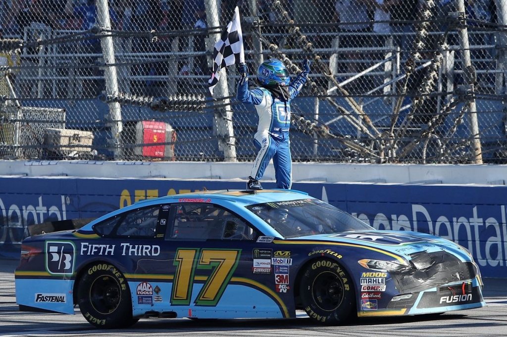 Ricky Stenhouse Jr. celebrates winning the Geico 500 Sunday at Talladega