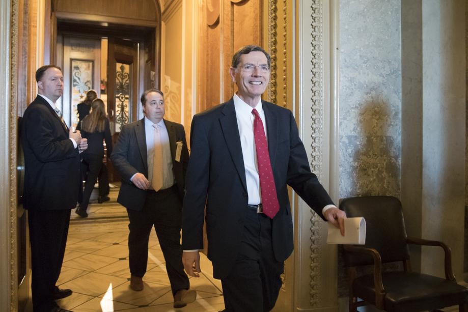 Sen. John Barrasso R-Wyo. chairman of the Senate Environment and Public Works Committee leaves the chamber following a surprising win for environmentalists and Democrats and a blow to the fossil-fuel industry as the Republican-led Senate failed in a