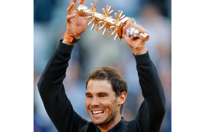 Spain's Rafael Nadal holds the Madrid Open Trophy after beating Austria's Dominic Thiem in the final Sunday. — AP