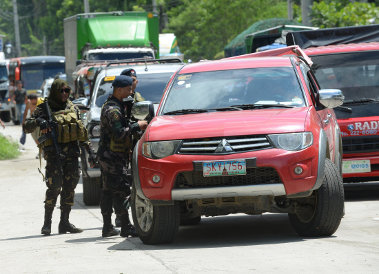 Philippine church says priest, churchgoers taken hostage