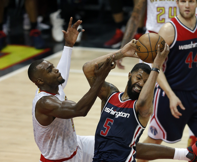 John Wall scores 42 points to finish off Hawks