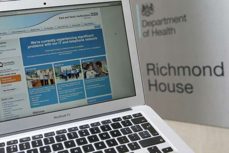 Britain's National Health Service says accident and emergency services in England are almost back to normal following an unprecedented global ransomware cyberattack