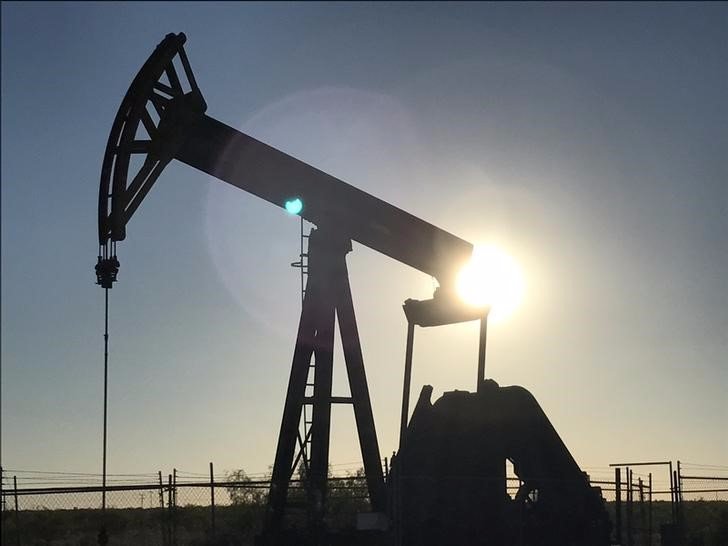 An oil rig drilling a well at sunrise near Midland  Texas   Thomson Reuters