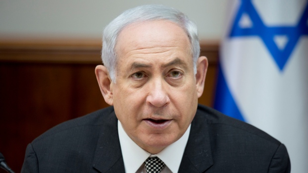 Israeli Prime Minister Benjamin Netanyahu chairs a weekly cabinet meeting at his office in Jerusalem