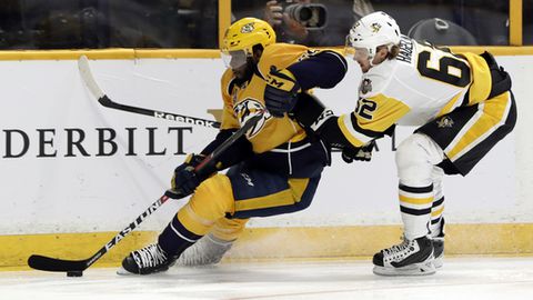 Nashville Predators defenseman P.K. Subban left tries to skate past Pittsburgh Penguins left wing Carl Hagelin of Sweden right during the second period in Game 3 of the NHL hockey Stanley Cup Finals Saturday