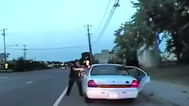 Officer Jernimo Yanez points his firearm at Philando Castile during a traffic stop in Minnesota Screencapture via YouTube