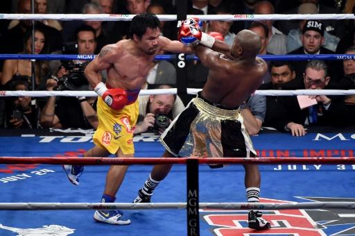 Pacquiao eyeing Mayweather rematch says trainer