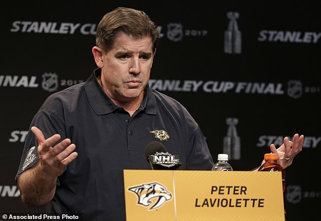 Nashville Predators head coach Peter Laviolette answers a question during a news conference at the NHL hockey Stanley Cup Finals Sunday