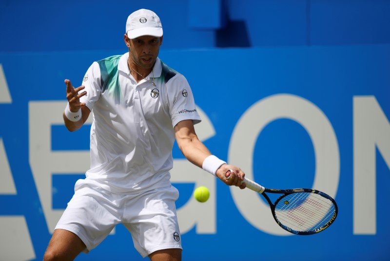 Luxembourg's Gilles Muller in action during his quarter final