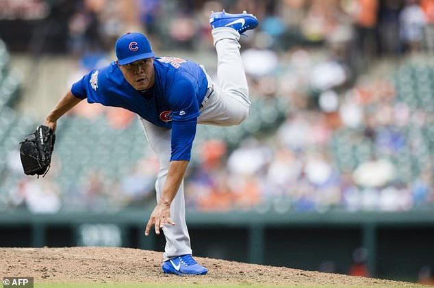 Starting pitcher Jose Quintana of the Chicago Cubs throws a pitch to a Baltimore Orioles batter in the fifth inning during their MLB game at Oriole Park at Camden Yards in Baltimore Maryland