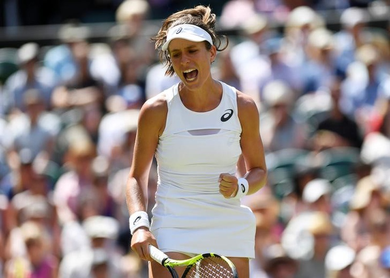 Great Britain's Johanna Konta celebrates during her second round match against Croatia