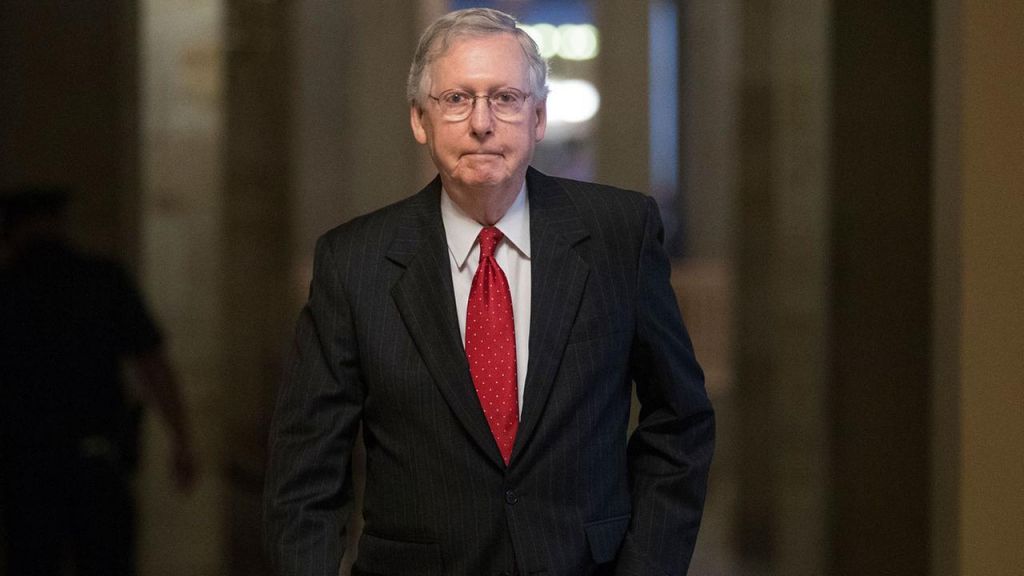 Senate Majority Leader Mitch Mc Connell of Ky. walks from his office to the Senate floor on Capitol Hill in Washington Wednesday July 26