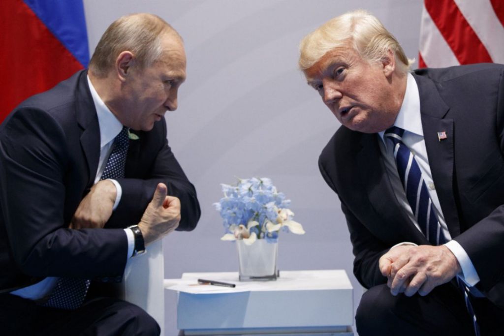 It was not immediately clear how long the informal conversation lasted between Donald Trump and Vladimir Putin or what was discussed