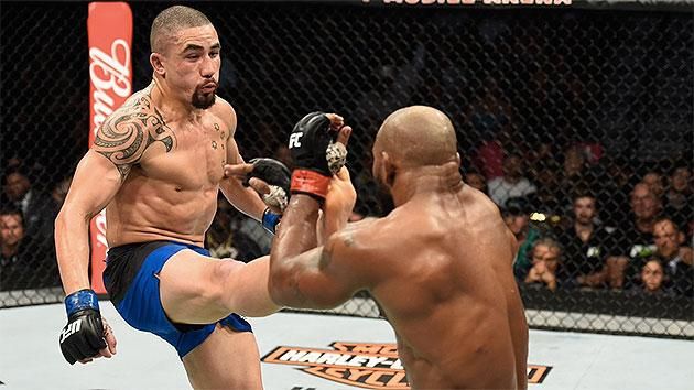 Whittaker becomes Australia's first UFC title holder. Pic Twitter