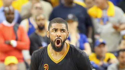 OAKLAND CA- JUNE 12 Kyrie Irving #2 of the Cleveland Cavaliers celebrates during the game against the Golden State Warriors in Game Five of the 2017 NBA Finals