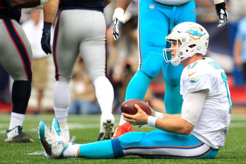 Dolphins QB Ryan Tannehill suffers apparent leg injury during fall