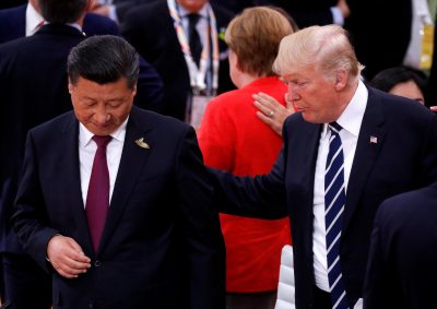 US President Donald Trump talks to China's President Xi Jinping during the G20 leaders summit in Hamburg Germany 7 July 2017